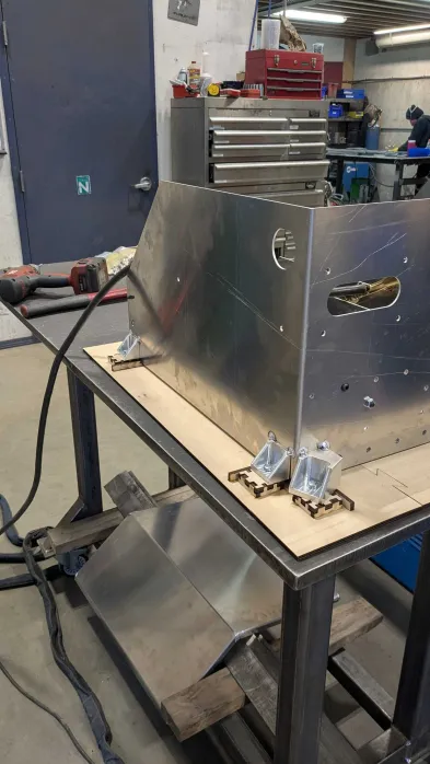Close-up of clamped mount tabs indexed against the baseplate inserts