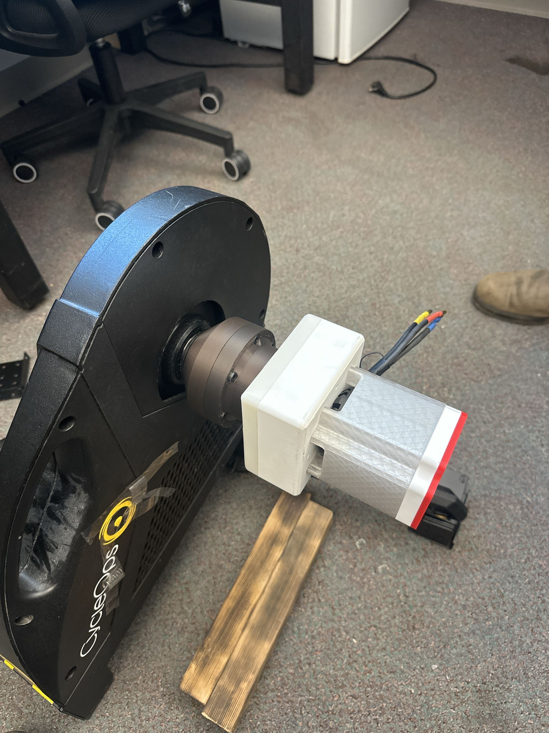 D6374 motor on the bench test stand coupled to the Saris H2 flywheel through a 5:1 gearbox